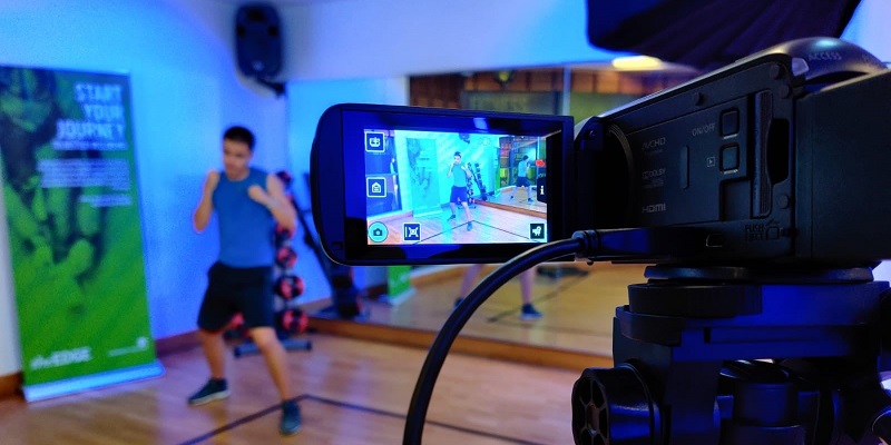 camera filming someone in an exercise studio
