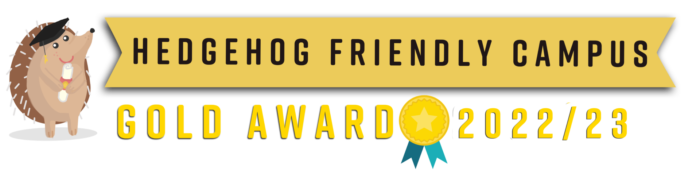 Banner has a cartoon image of a hedgehog and the words 'Hedgehog Friendly Campus, Gold Award 2022/23'